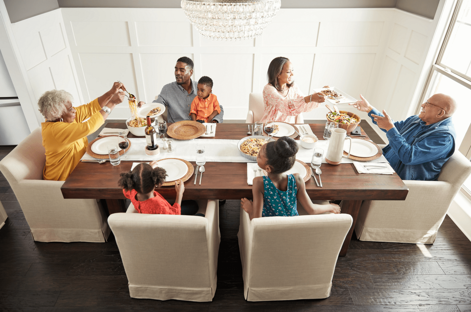 Family having breakfast at the dining table | West Michigan Carpet Center